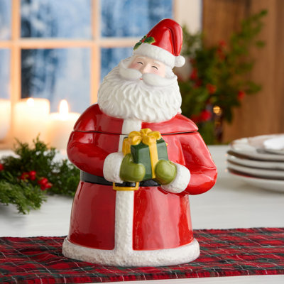 Bocal à biscuits Santa Delight 3-D - Un bocal à biscuits sculptural Santa à couper le souffle en céramique richement émaillée, de 12 pouces de hauteur et contenant 64 onces de magie des Fêtes et de biscuits.
