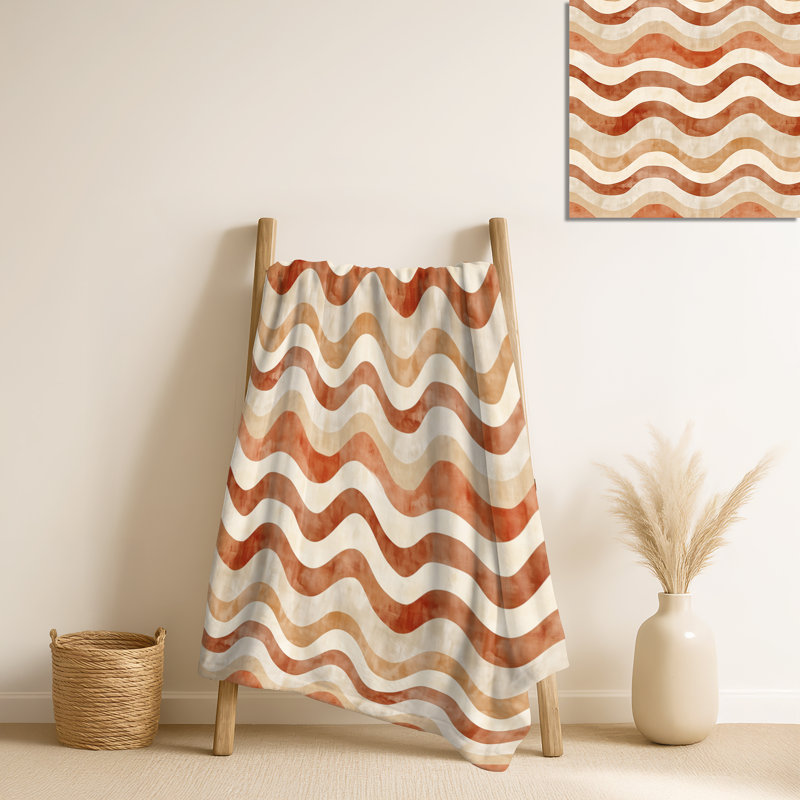 Coussin orange, orange et brun