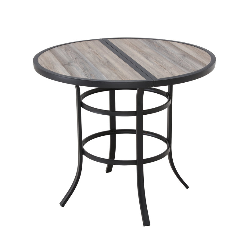 Gunselman 4 - Person Wicker Patio Dining Set with Round Table