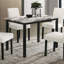 Ensemble de salle à manger contemporain en tissu de laine avec plateau en faux marbre et chaises rembourrées, parfait pour des repas élégants et confortables.