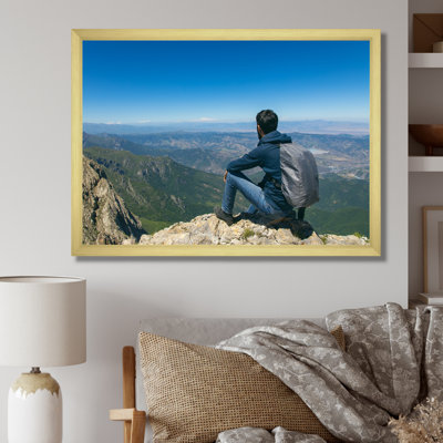 " Young Man Hiking Mountain "
