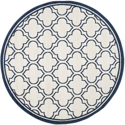 Ammundsen Geometric Area Rug in Ivory/Navy