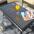 Hilbrand L42.55" x W22.85" x H18.91" Steel Wicker Glass Top Coffee Table