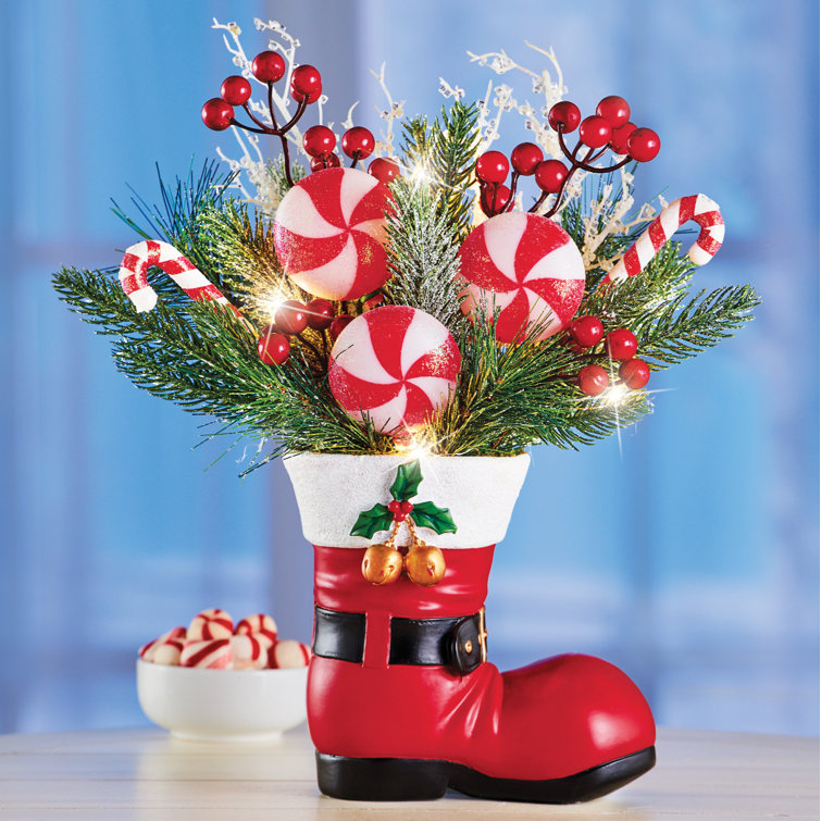 https://assets.wfcdn.com/im/20663552/resize-h755-w755%5Ecompr-r85/2208/220848201/Lighted+Santa+Boot+Centerpiece.jpg