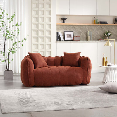 Fauteuil à billes doux avec noyau en mousse haute résilience pour deux personnes.