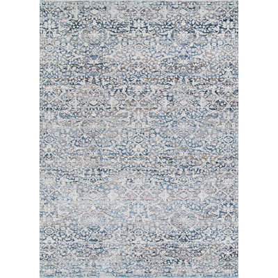 Tapis beige à motif floral Versus