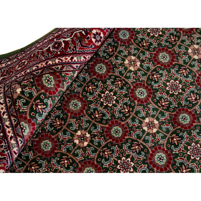 Tapis oriental rouge / vert noué à la main