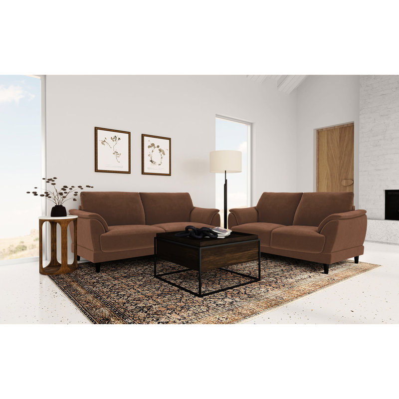 Style rétro avec revêtement rouille, dossier et siège lisses pour un espace paisible et confortable. Accoudoirs élégamment inclinés et rembourrés, coussins moelleux. Silhouette charmante.
