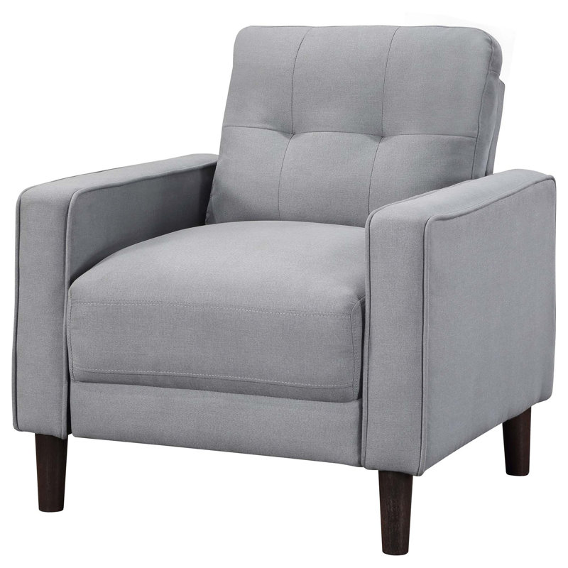Chaise d'appoint rembourrée capitonnée avec design compact et confort à ressorts ensachés