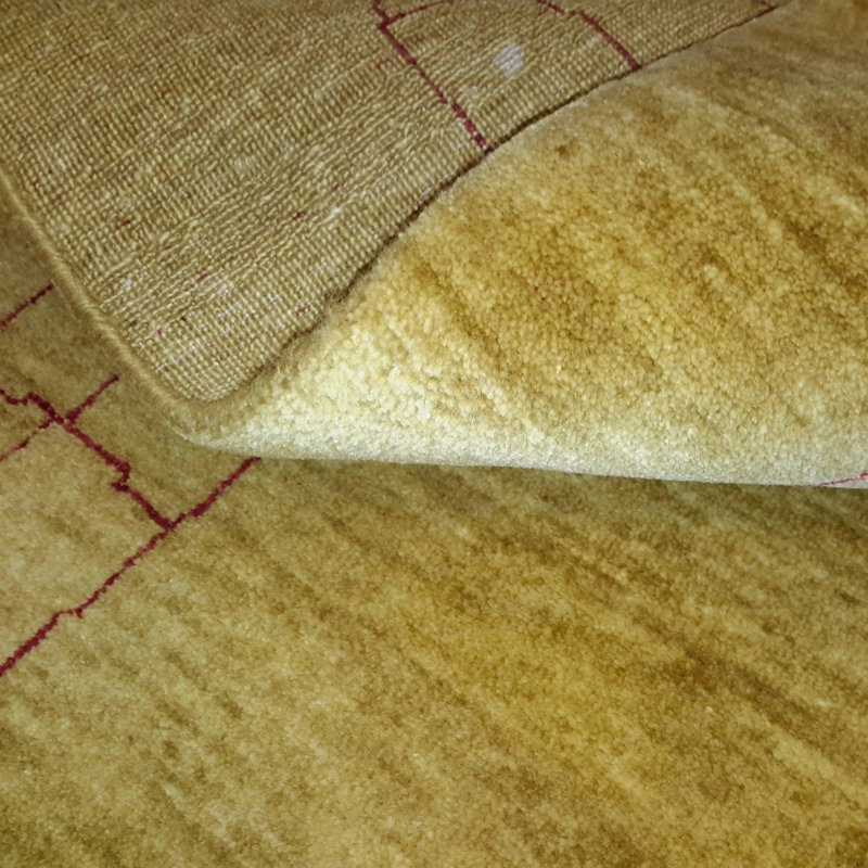 Tapis jaune unique 4 pi 7 po x 6 pi 9 po Aziyah