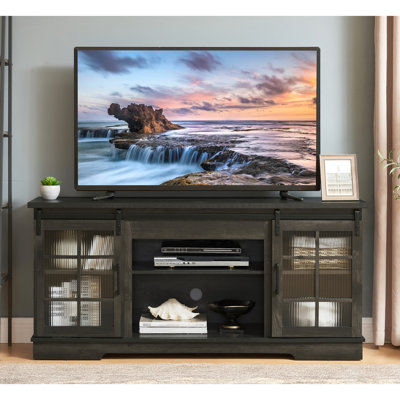 Meuble télé 65 po avec finition gris anthracite et porte de rangement coulissante en verre 2 entrées cannelées, pour téléviseur 65 po gris, l 59,96 po x P 16,18 po x H 27,8 po, zone abondante