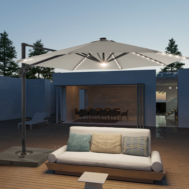 Eirlys 132'' Lighted Cantilever Umbrella with Crank Lift Counter Weights Included