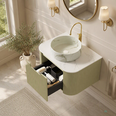 Meuble-lavabo de 61 cm (24 po) avec lavabo intégré, bords incurvés, rangement intégré en contreplaqué rayé, tiroir, lavabo en céramique à motif pierre et dessus en pierre frittée, préassemblé.