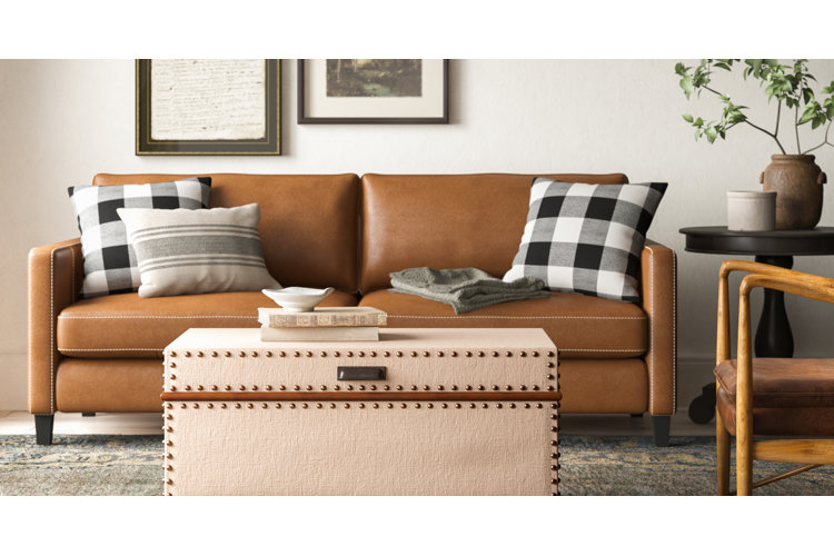 leather sofa with buffalo check plaid pillows