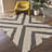 Soft and supple rug in recycled polyester and jute