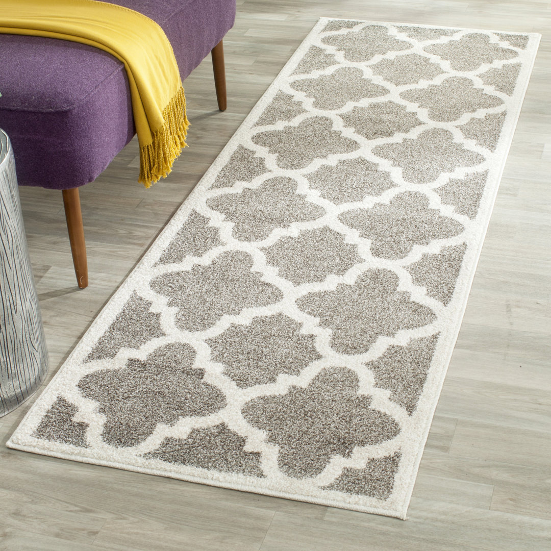Kathy Geometric Hand Woven Indoor / Outdoor Area Rug