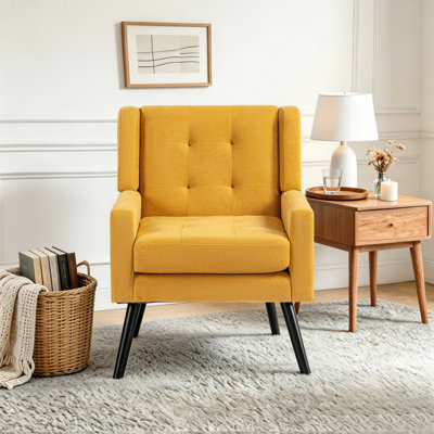 Fauteuil capitonné à dossier large rembourré