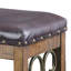 Banc en cerisier noir et vieilli avec garniture cloutée