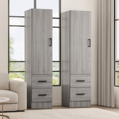  Armoire garde-robe avec 2 tiroirs et une porte pouvant s'ouvrir de la gauche ou de la droite.
