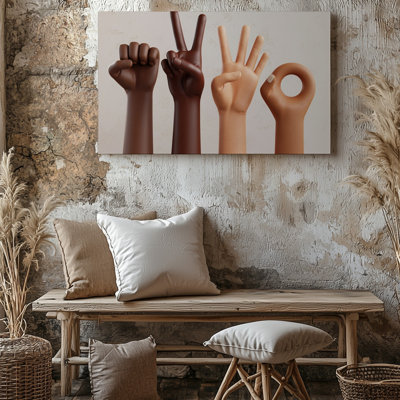 Toile une illustration vibrante mettant en vedette quatre mains diverses positionnées contre un art mural