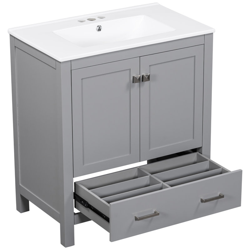 30" Bathroom Vanity In Black. Solid Wood Frame. Single Sink With 2 Doors And A Drawer For Efficient Storage Black Ceramic Sink. Construction, Soft Close Mechanism. 1 Storage. Rectangular Basin.