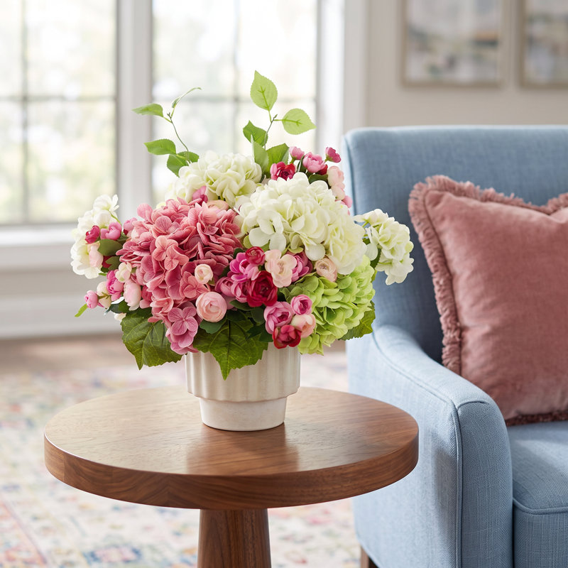 Hydrangeas and Ranunculus Arranged in Ceramic Pot