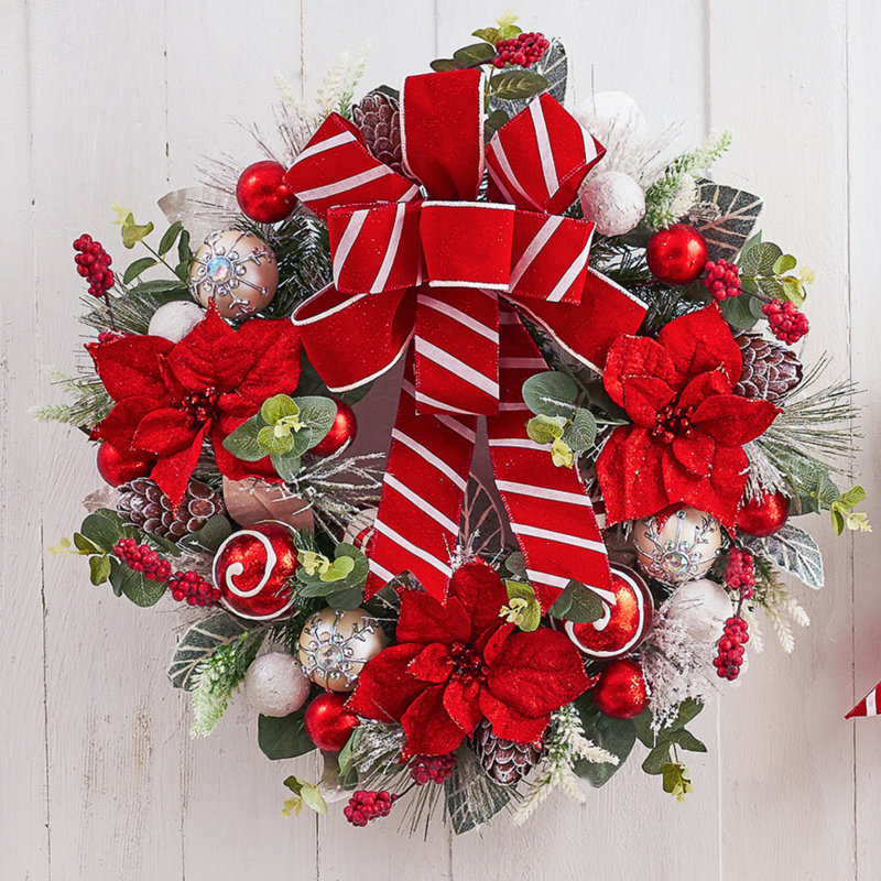 Couronne de poinsettia rouge givrée 22 po