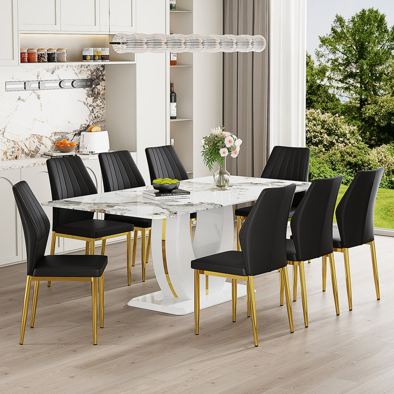 Ensemble de table de salle à manger rectangulaire de 71 po pour 8 personnes comprenant un plateau en faux marbre et des chaises en cuir de polyuréthane. Cet ensemble de salle à manger de 9 pièces convient aux maisons, aux restaurants et aux espaces de bureau.