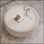 1 table basse ronde cannelée blanche pour salon moderne et minimaliste