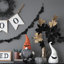 Gnome assis en tissu avec un chapeau tricoté orange, pour la décoration d'Halloween