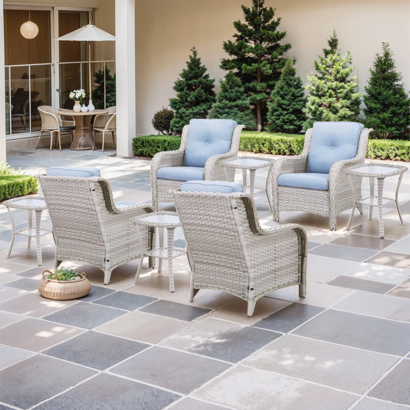 Ensemble de conversation à plusieurs chaises en rotin 8 pièces avec coussins et table d'appoint Schutt, Bleu pastel
