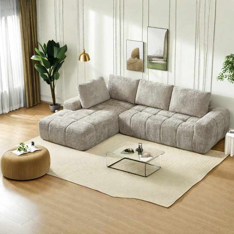 Canapé modulaire en L spacieux et modulaire en chenille avec un design moderne, parfait pour le salon et les appartements