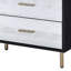 Commode noire, argentée et dorée