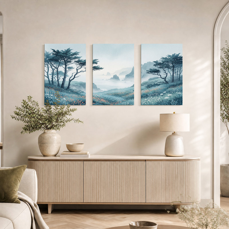 Ensemble de 3 toiles murales représentant une vue brumeuse sur l'océan avec des arbres et des fleurs sauvages