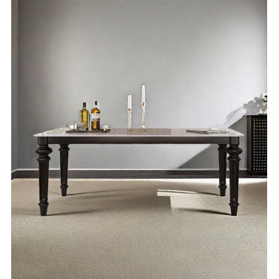 Black American-style retro dining table with a sintered stone tabletop and solid wood frame, in rectangular shape