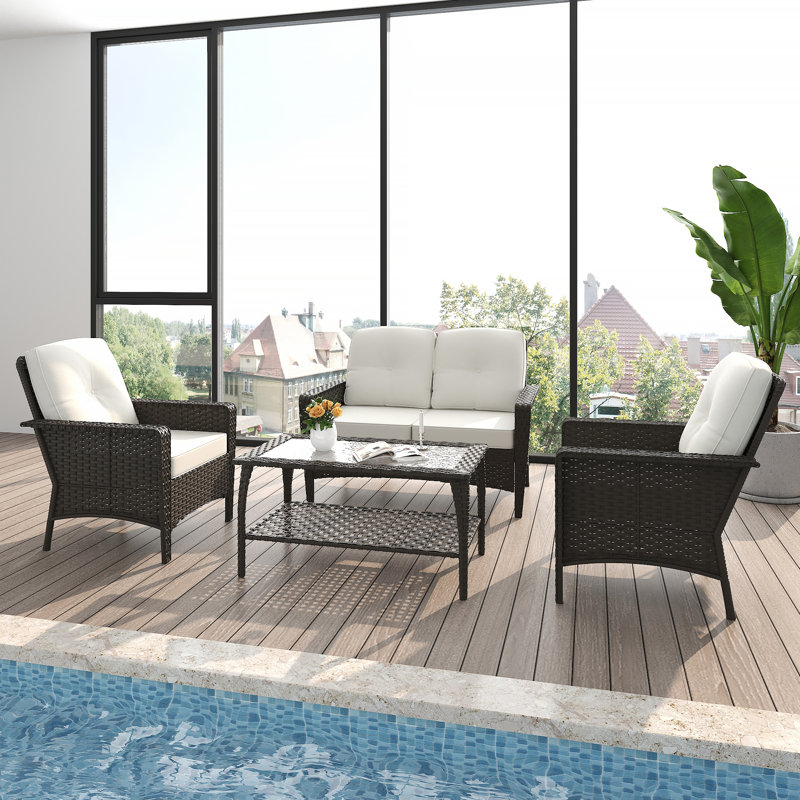 4-Piece Rattan Outdoor Sofa Seating Group with Cushions: Includes Loveseat, 2 Armchairs, and Coffee Table - Premium Patio Furniture for Backyard or Deck