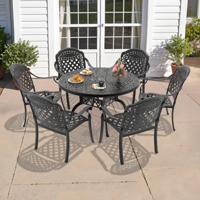 Haverville 48.03 -inch Round Table Cast Aluminum Outdoor Dining Set with Umbrella Hole and Red Cushions