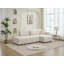 Canapé d'angle capitonné en L d'inspiration scandinave avec coussins décoratifs