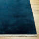 Clio Solid Color Hand Loomed Wool Area Rug in Blue