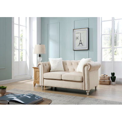 Causeuse élégante beige avec touche moderne