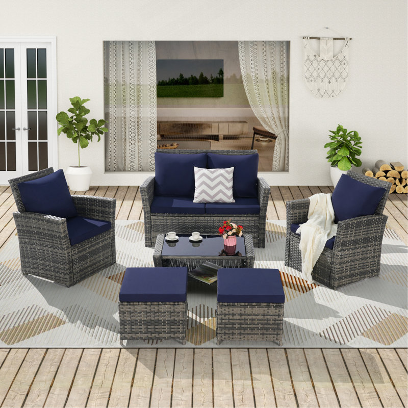 Ensemble de meubles de patio en osier 6 pièces avec repose-pieds et table basse en verre trempé, Bleu très foncé