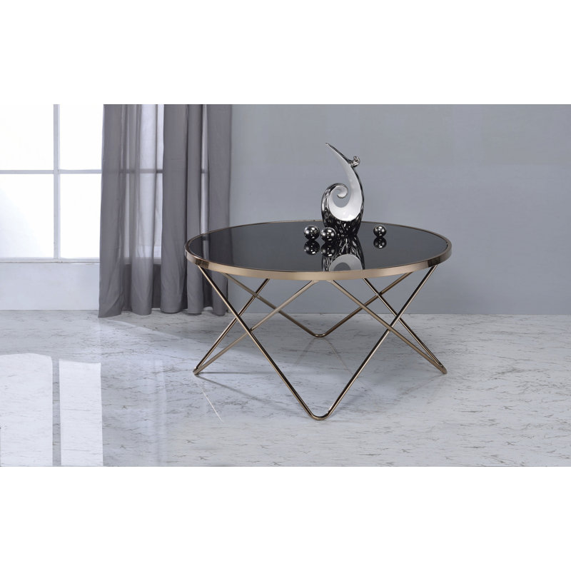 Table basse en verre noir et finition champagne