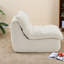 Canapé beige moderne avec structure en métal, salon confortable et compact pour la maison ou le bureau