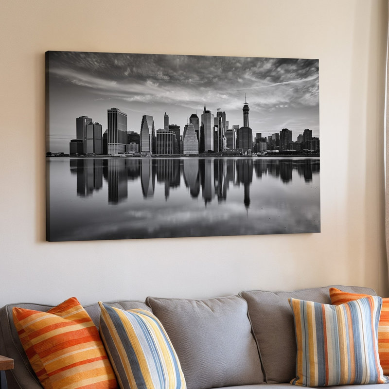 Toile, horizon panoramique en noir et blanc avec de grands gratte-ciels modernes reflétant une surface d'eau calme créant une toile