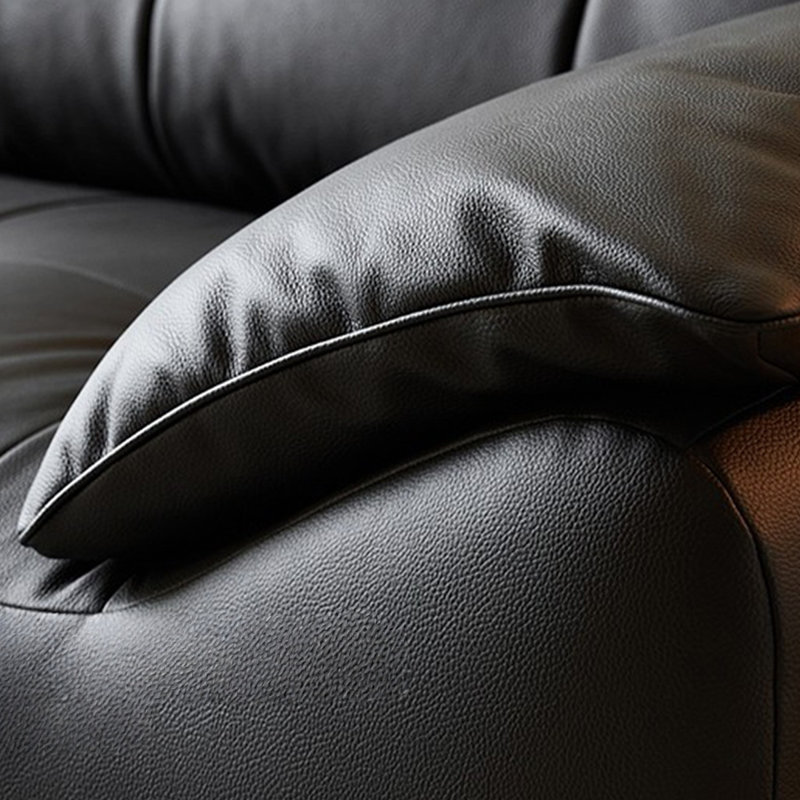 Causeuse-coussin modulable noire en cuir véritable