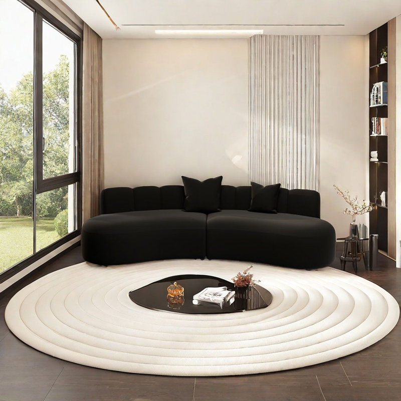 Black semi-circular curved corner sofa, 25.59" H x 118.11" W x 33.47" D, 5