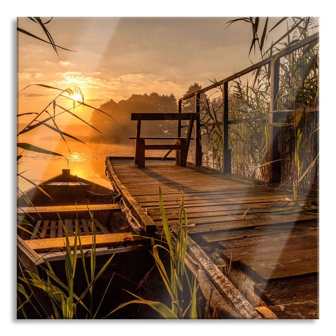 Ungerahmtes Foto auf Glas "Bootssteg am See bei Sonnenuntergang"