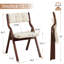 Chaise pliante au design élégant avec structure en bois massif et dossier et siège rembourrés capitonnés-2131068425