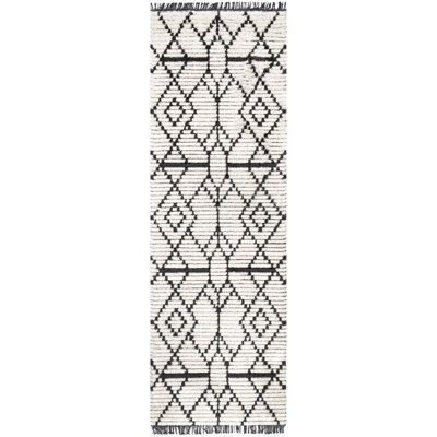 Tapis beige à poils longs texturé Nola