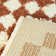 Walker Checkered Burnt Orange/Cream Shag Area Rug